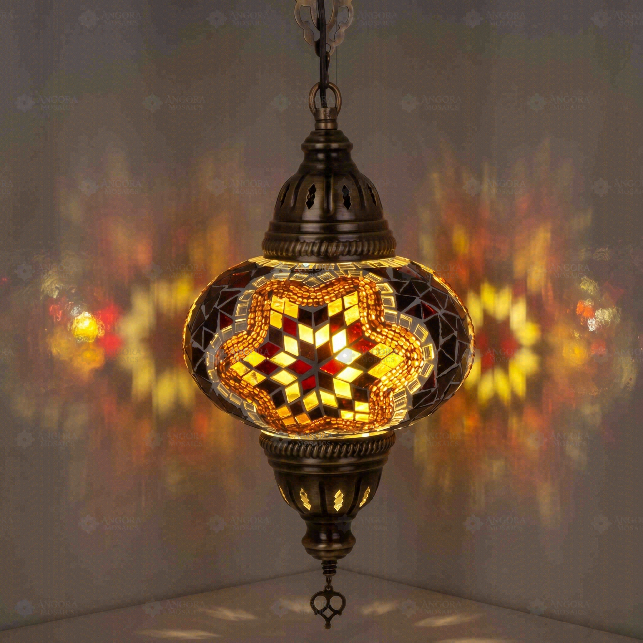 Amber Turkish mosaic pendant light illuminated, showing colorful light projection (ENV DYN3031)