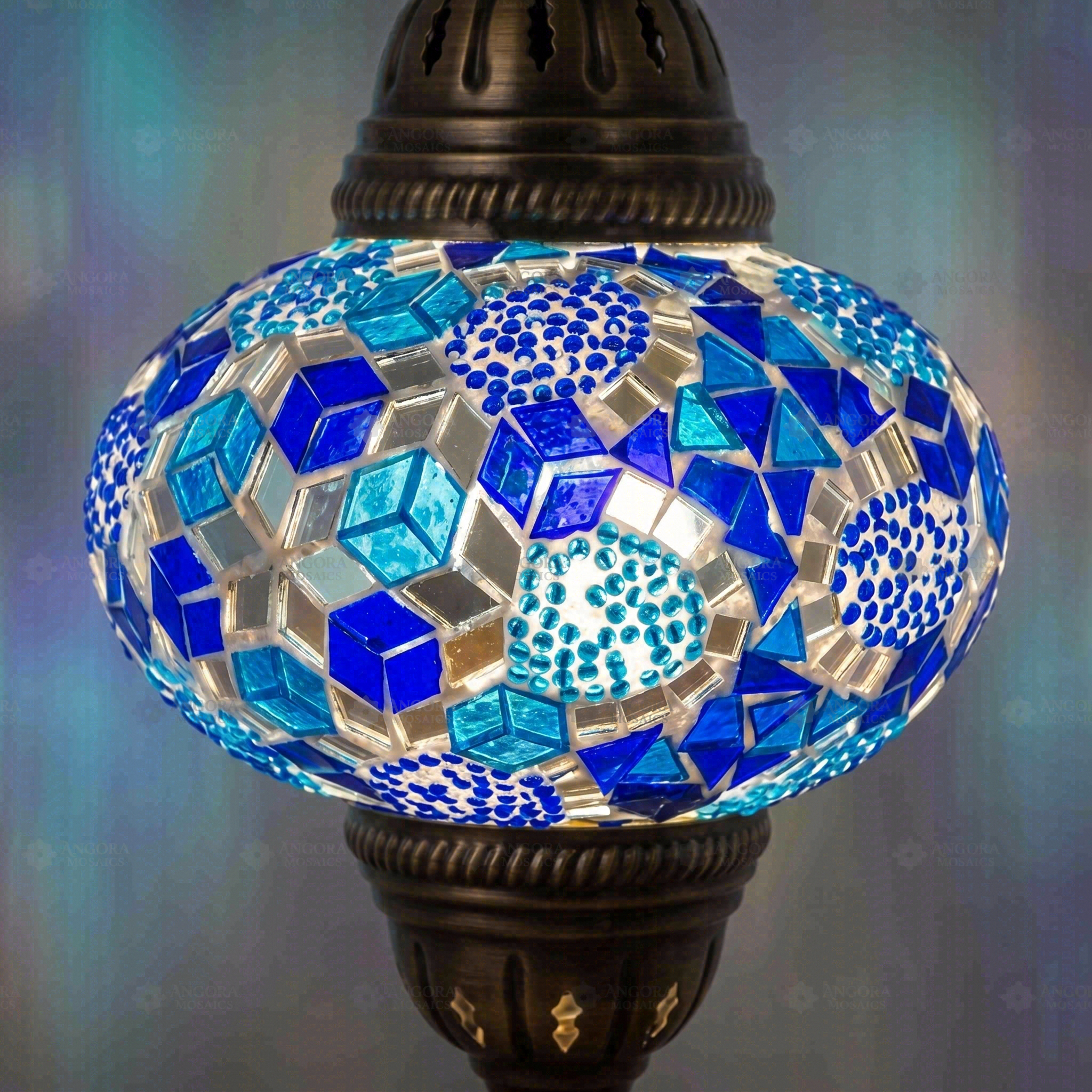 Lit close-up of mosaic glass globe — Blue pendant light glowing (ENV DYN3032)