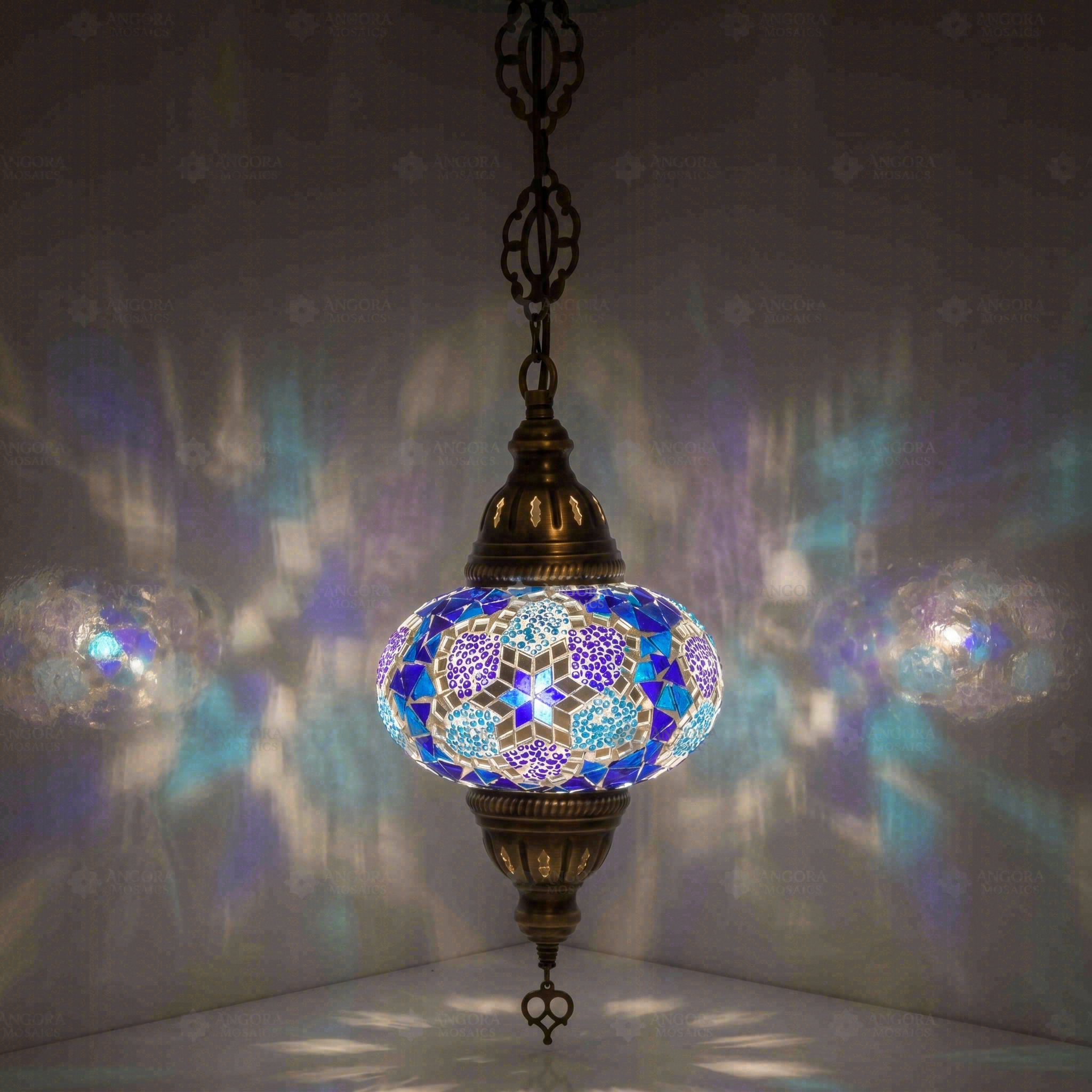Blue Turkish mosaic pendant light illuminated, showing colorful light projection (ENV DYN3034)