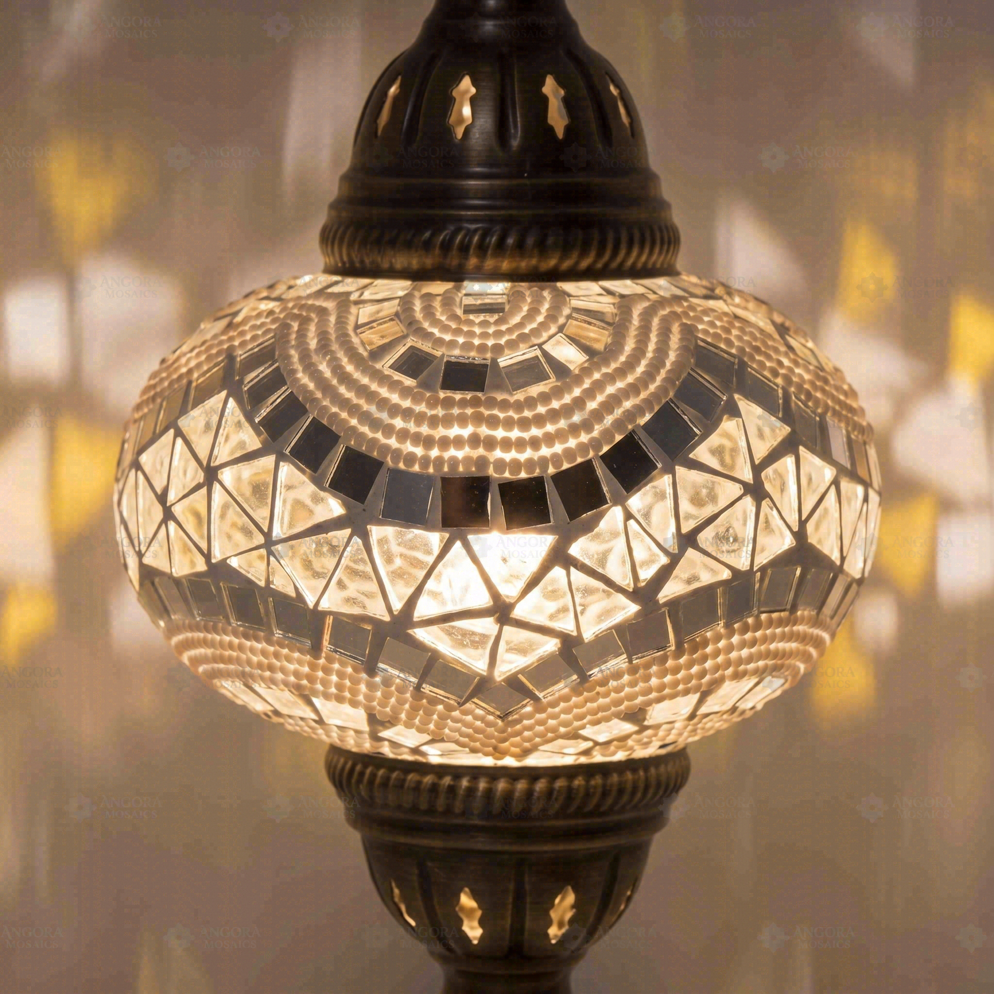 Lit close-up of mosaic glass globe — White pendant light glowing (ENV DYN3036)