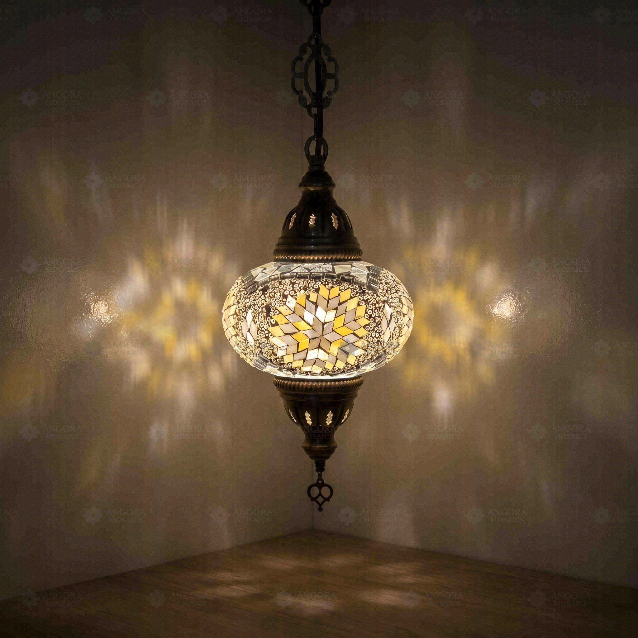 White Turkish mosaic pendant light illuminated, showing colorful light projection (ENV DYN3043)