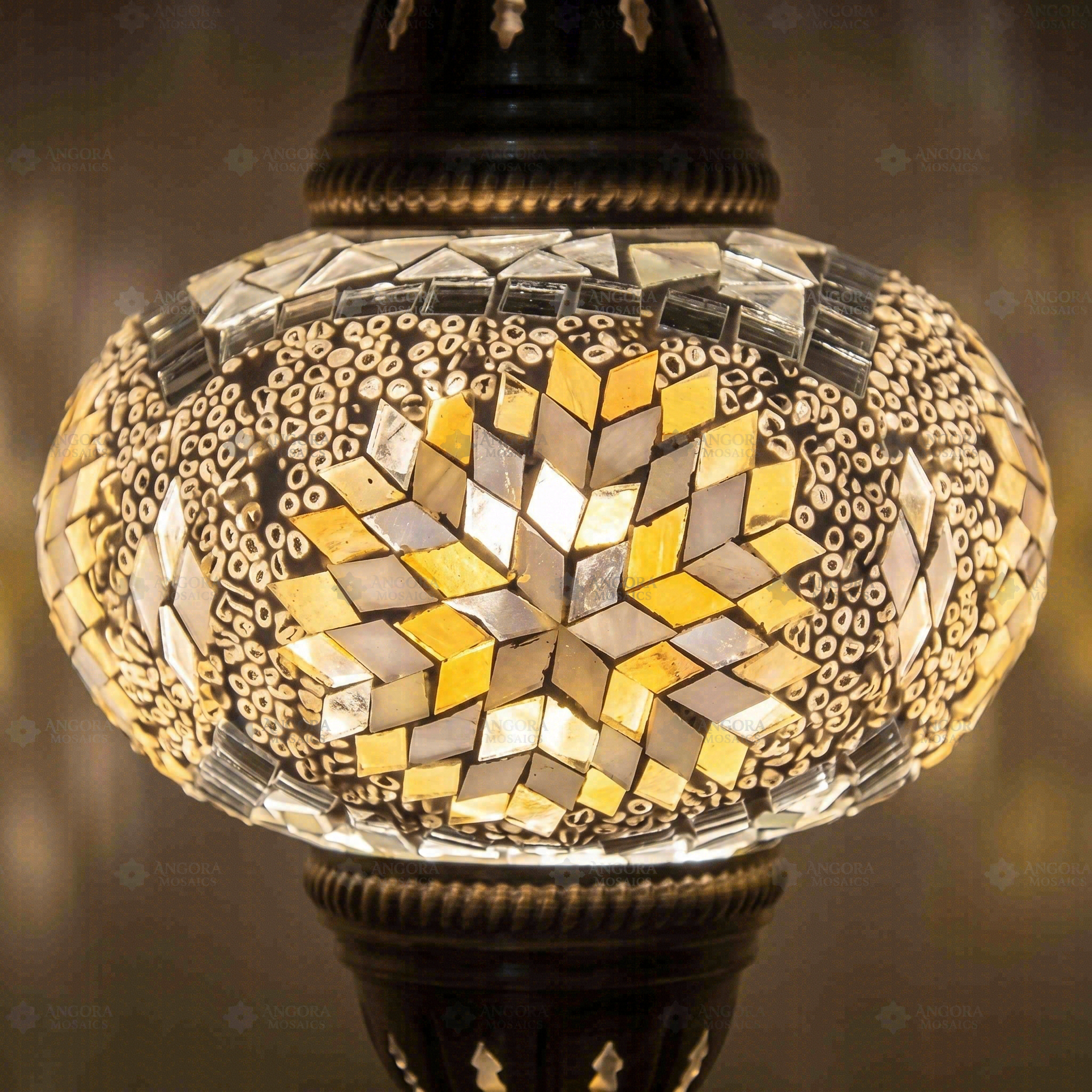Lit close-up of mosaic glass globe — White pendant light glowing (ENV DYN3043)