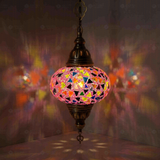 Pink Turkish mosaic pendant light illuminated, showing colorful light projection (ENV DYN3046)