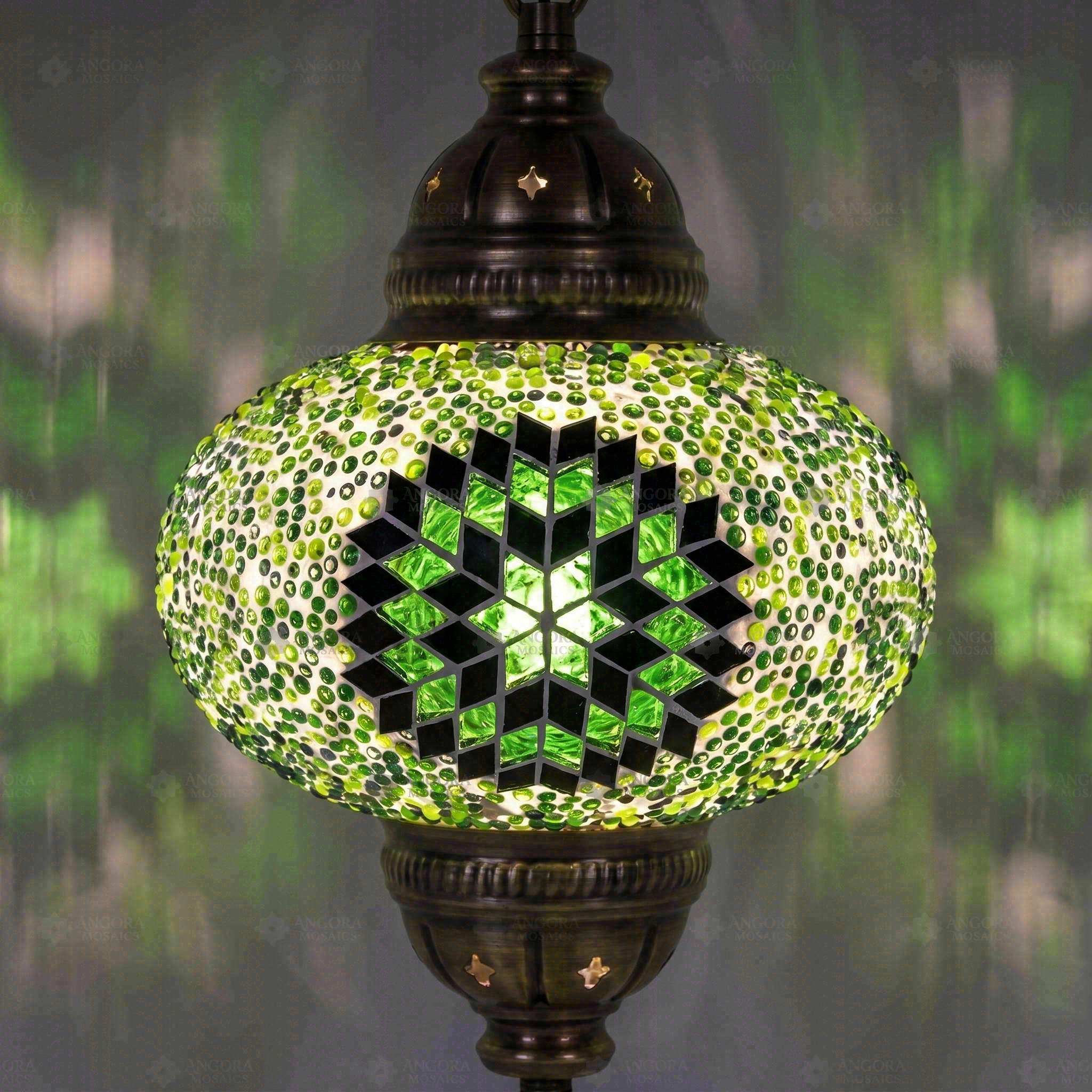 Lit close-up of mosaic glass globe — Green pendant light glowing (ENV DYN3048)
