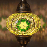Lit close-up of mosaic glass globe — Green pendant light glowing (ENV DYN3050)