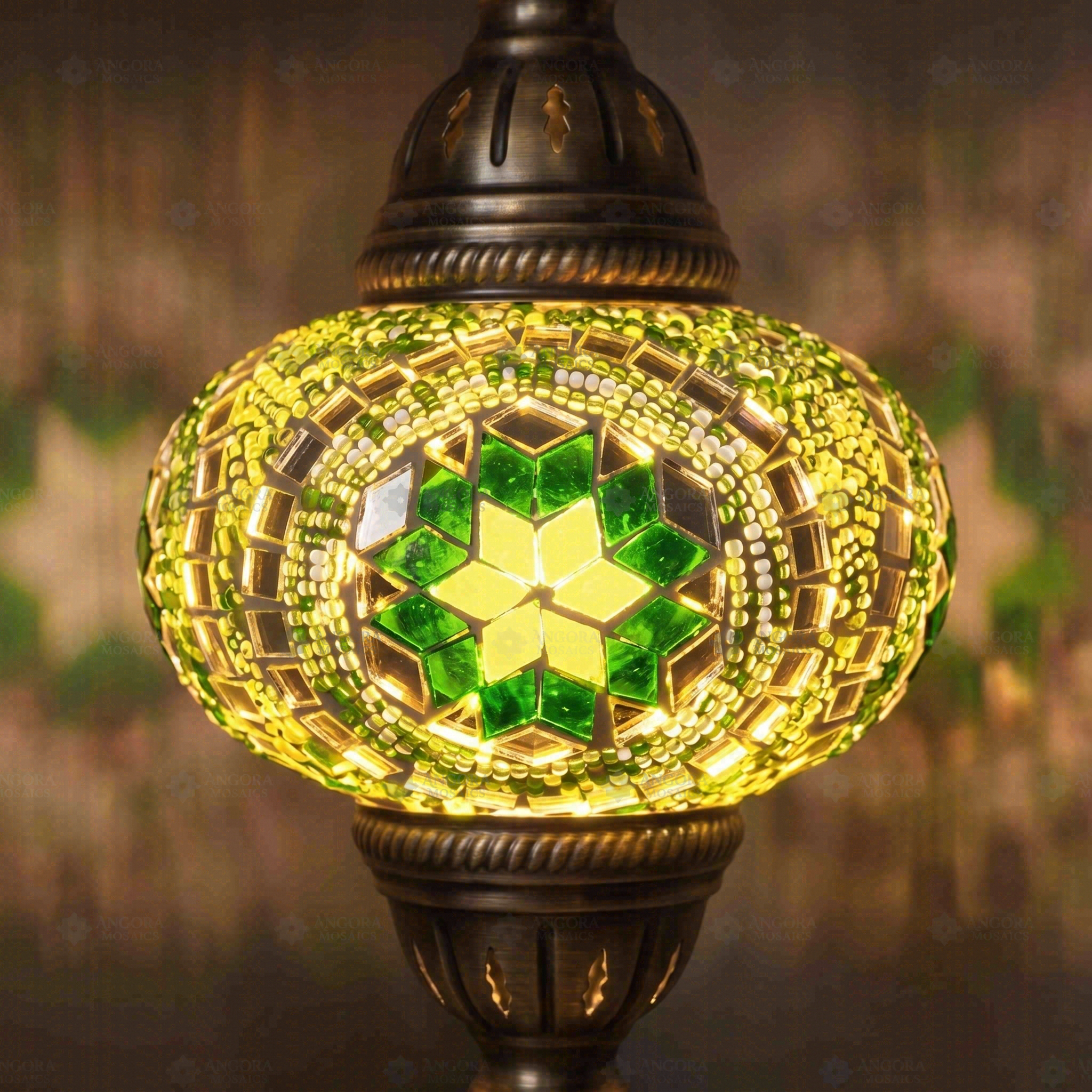 Lit close-up of mosaic glass globe — Green pendant light glowing (ENV DYN3050)