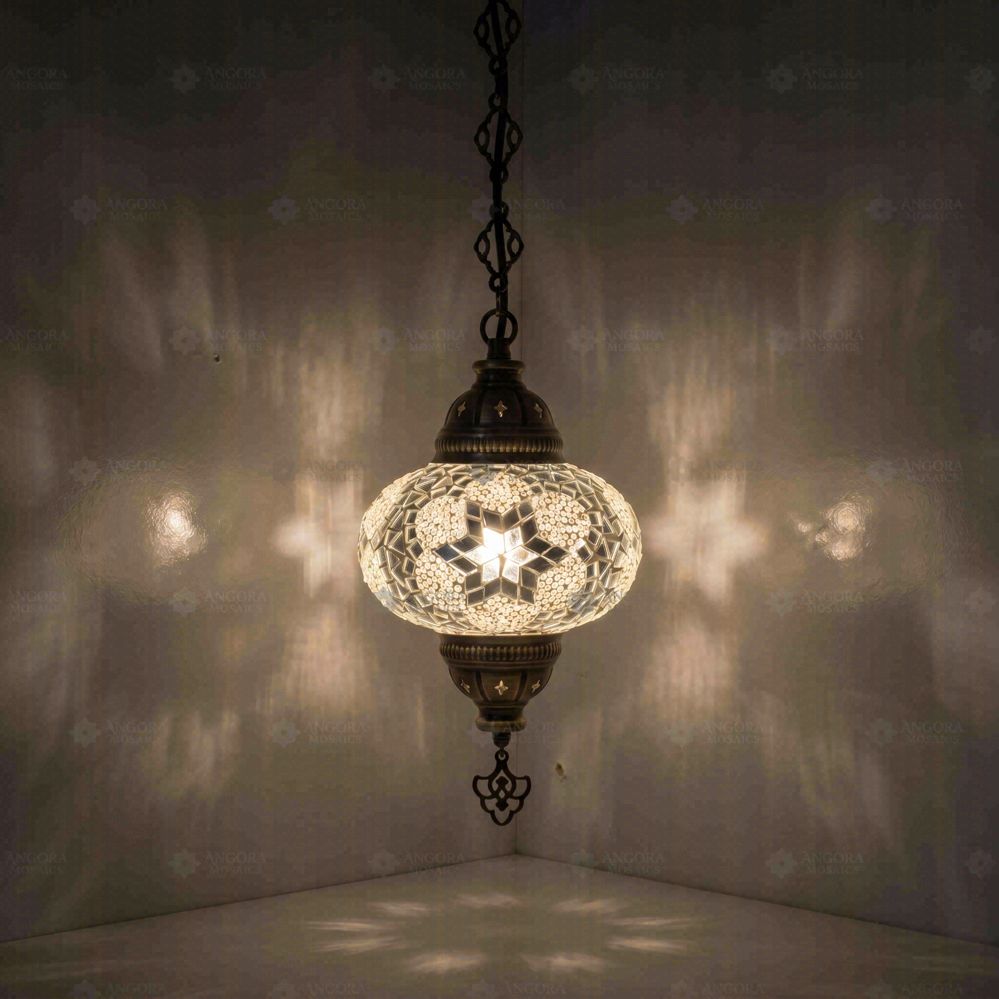 White Turkish mosaic pendant light illuminated, showing colorful light projection (ENV DYN3054)