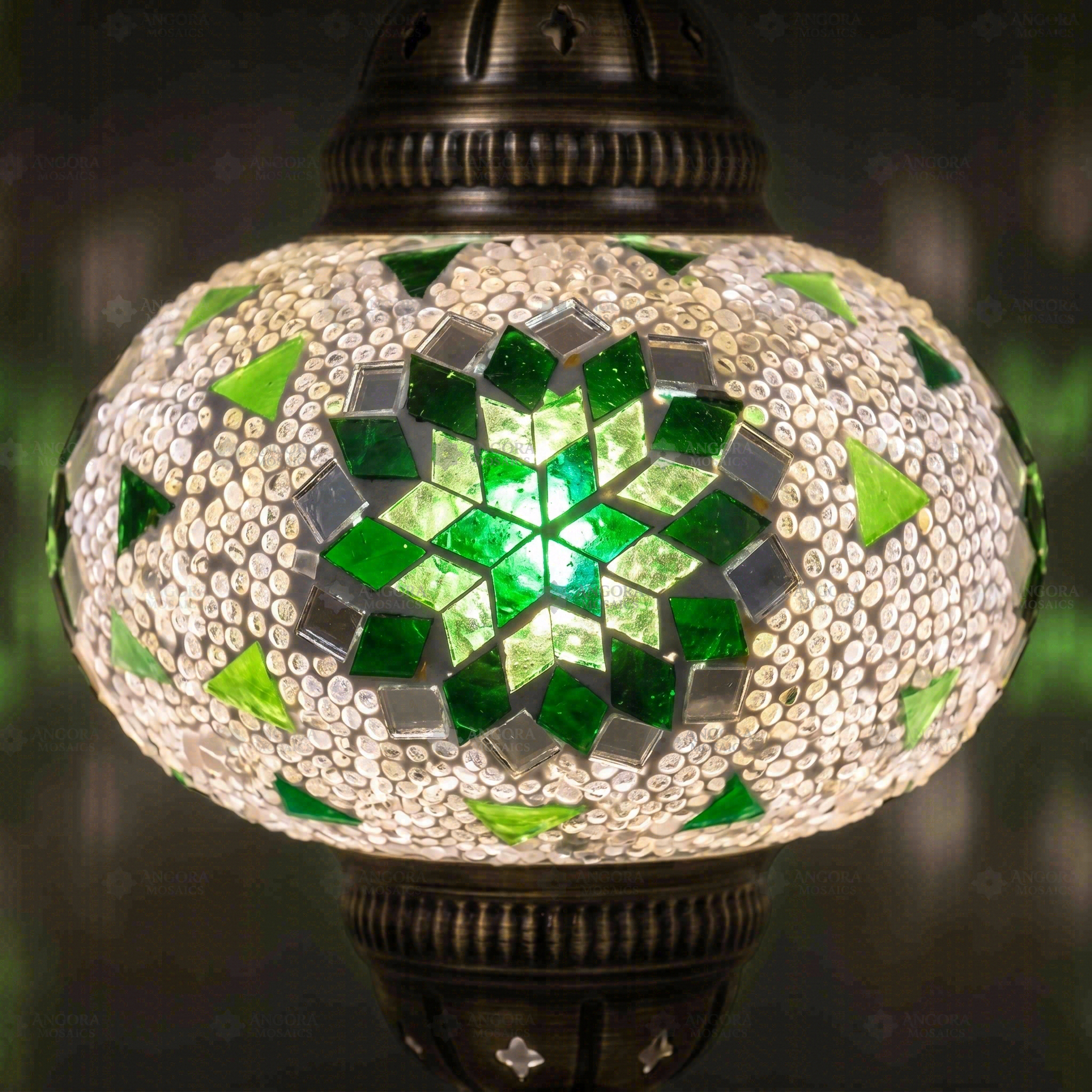 Lit close-up of mosaic glass globe — Green pendant light glowing (ENV DYN3055)