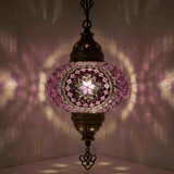 Purple Turkish mosaic pendant light illuminated, showing colorful light projection (ENV DYN3059)