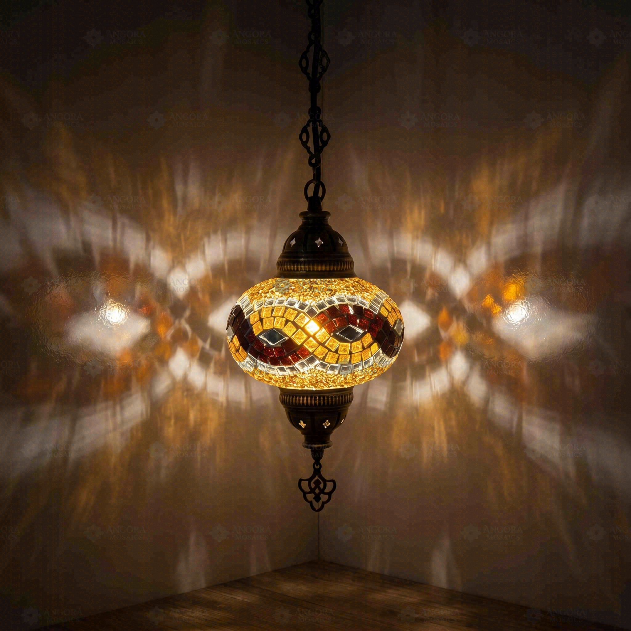 Amber Turkish mosaic pendant light illuminated, showing colorful light projection (ENV DYN3064)