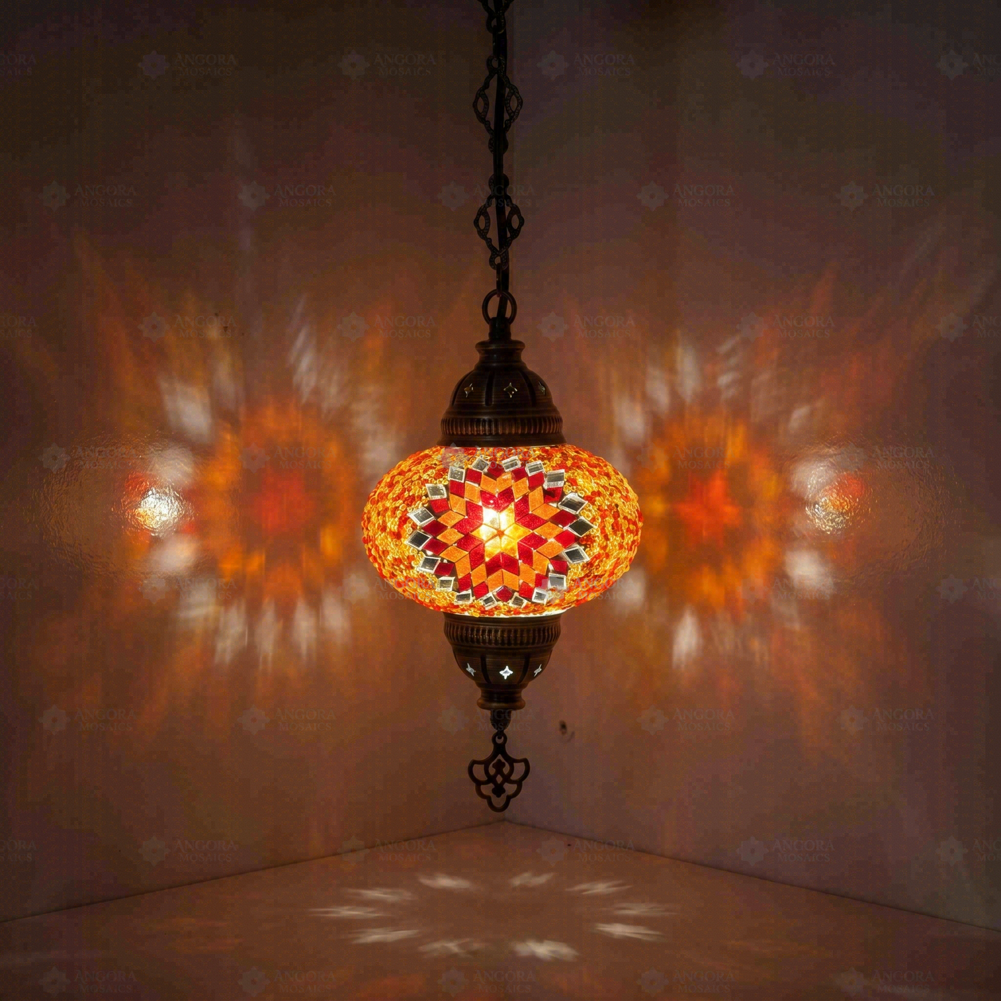 Amber Turkish mosaic pendant light illuminated, showing colorful light projection (ENV DYN3065)