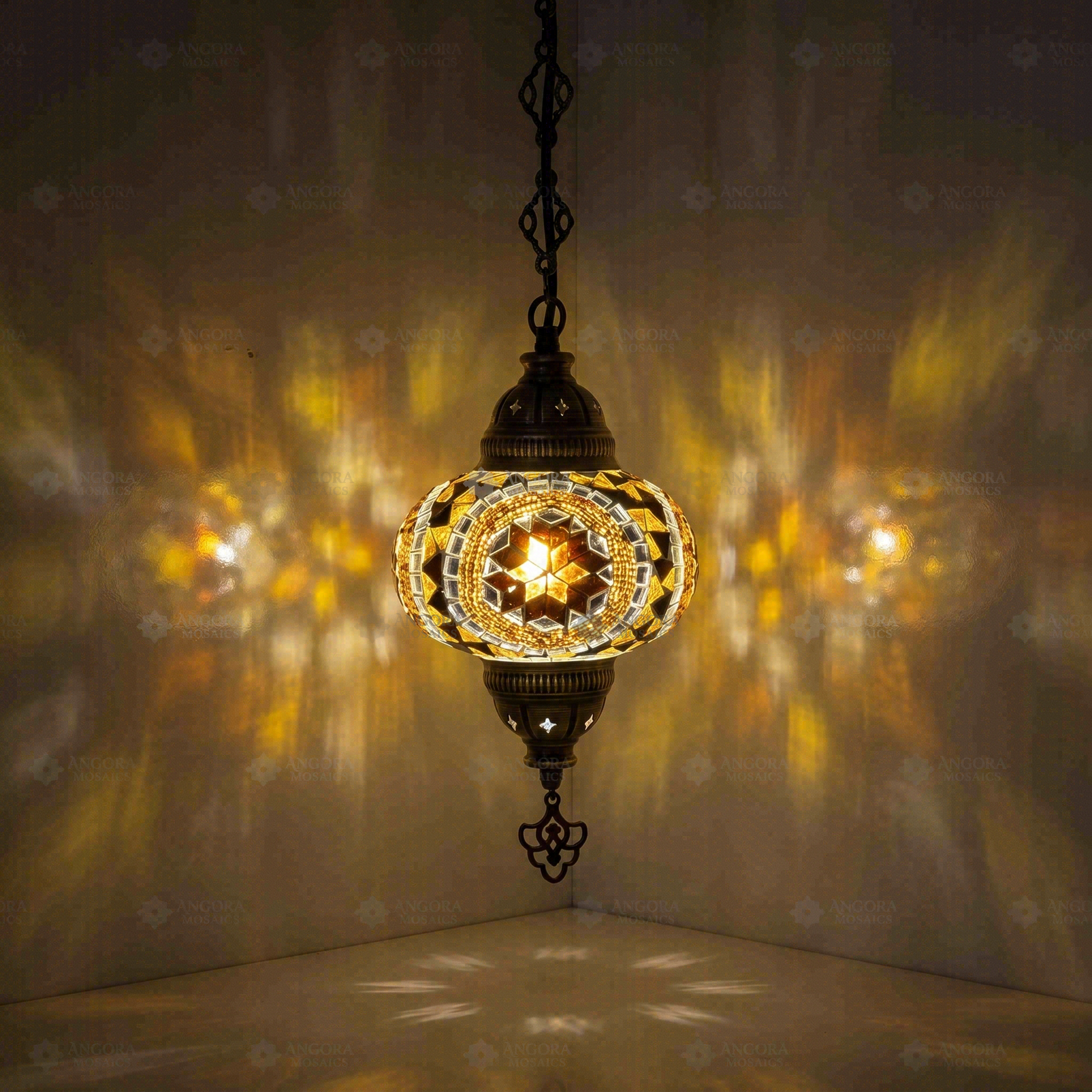 Amber Turkish mosaic pendant light illuminated, showing colorful light projection (ENV DYN3067)