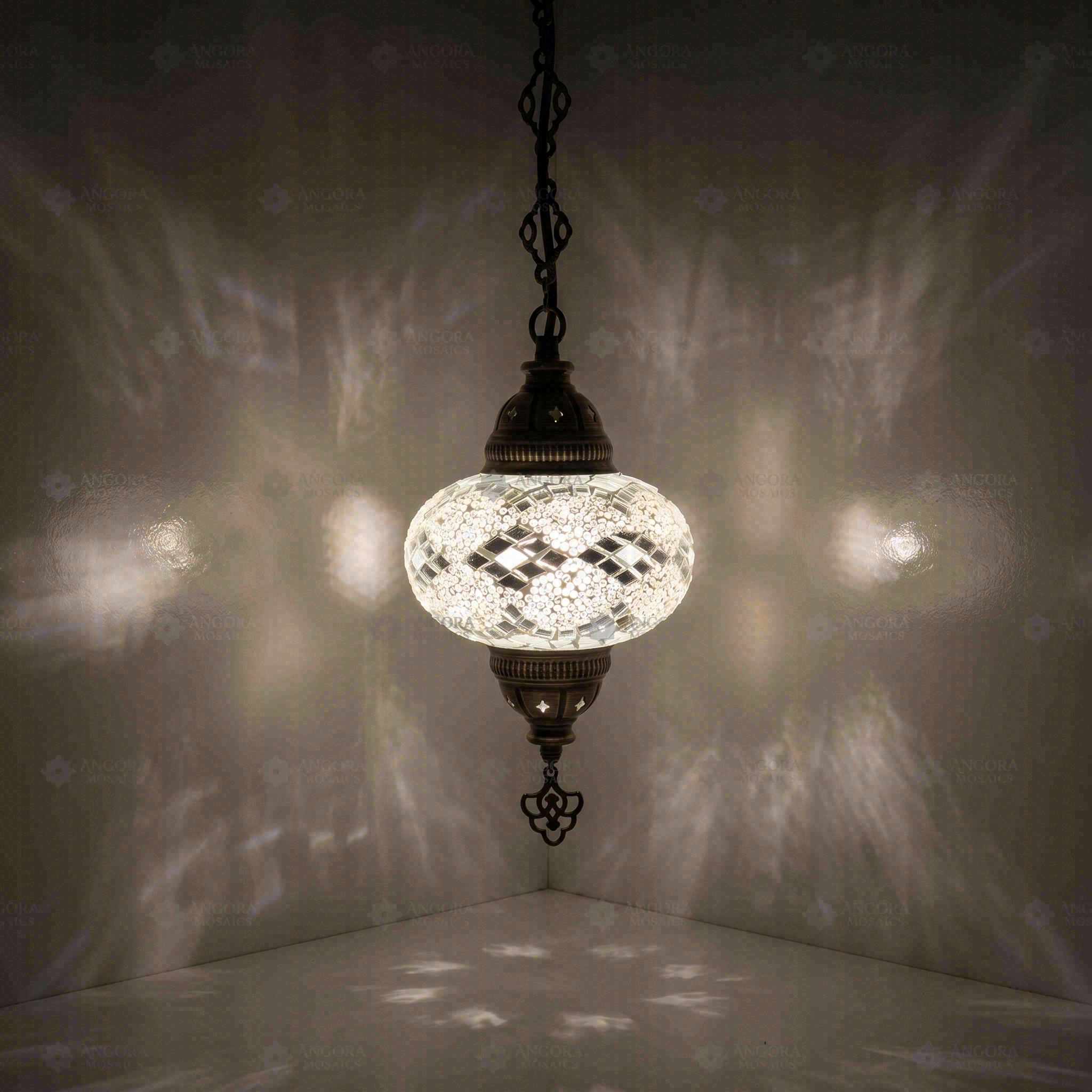 White Turkish mosaic pendant light illuminated, showing colorful light projection (ENV DYN3068)