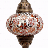Close-up of Amber warm amber mosaic glass globe pattern — pendant light (ENV DYN3079)