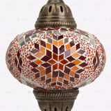 Close-up of Amber warm amber mosaic glass globe pattern — pendant light (ENV DYN3090)