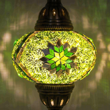 Lit close-up of mosaic glass globe — Green pendant light glowing (ENV DYN3096)