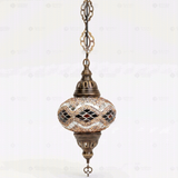 Full view of handmade Amber warm amber Turkish mosaic pendant light on white background (ENV DYN3097)