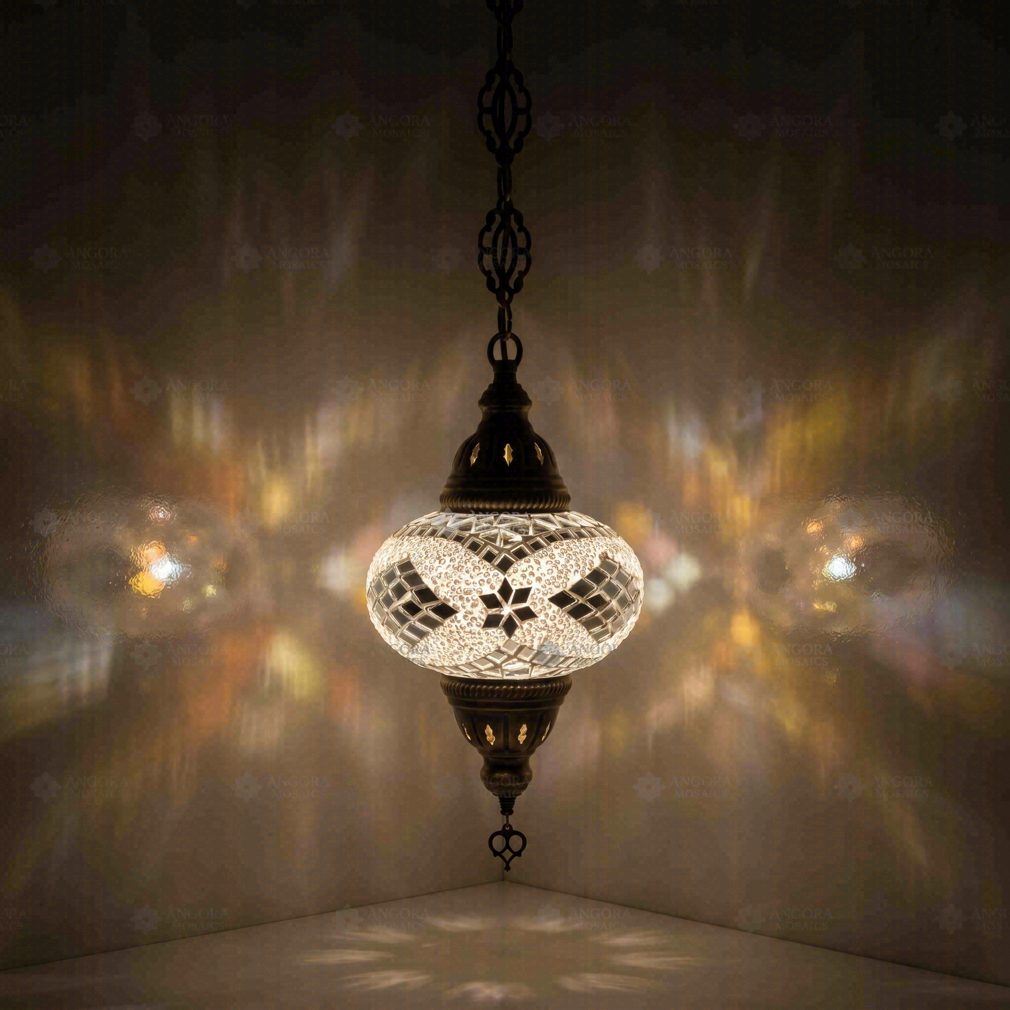 White Turkish mosaic pendant light illuminated, showing colorful light projection (ENV DYN3098)