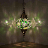 Green Turkish mosaic pendant light illuminated, showing colorful light projection (ENV DYN3100)