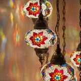 Lit close-up of mosaic glass globe — Multicolor chandelier glowing (ENV HLZ10N3 (3007))