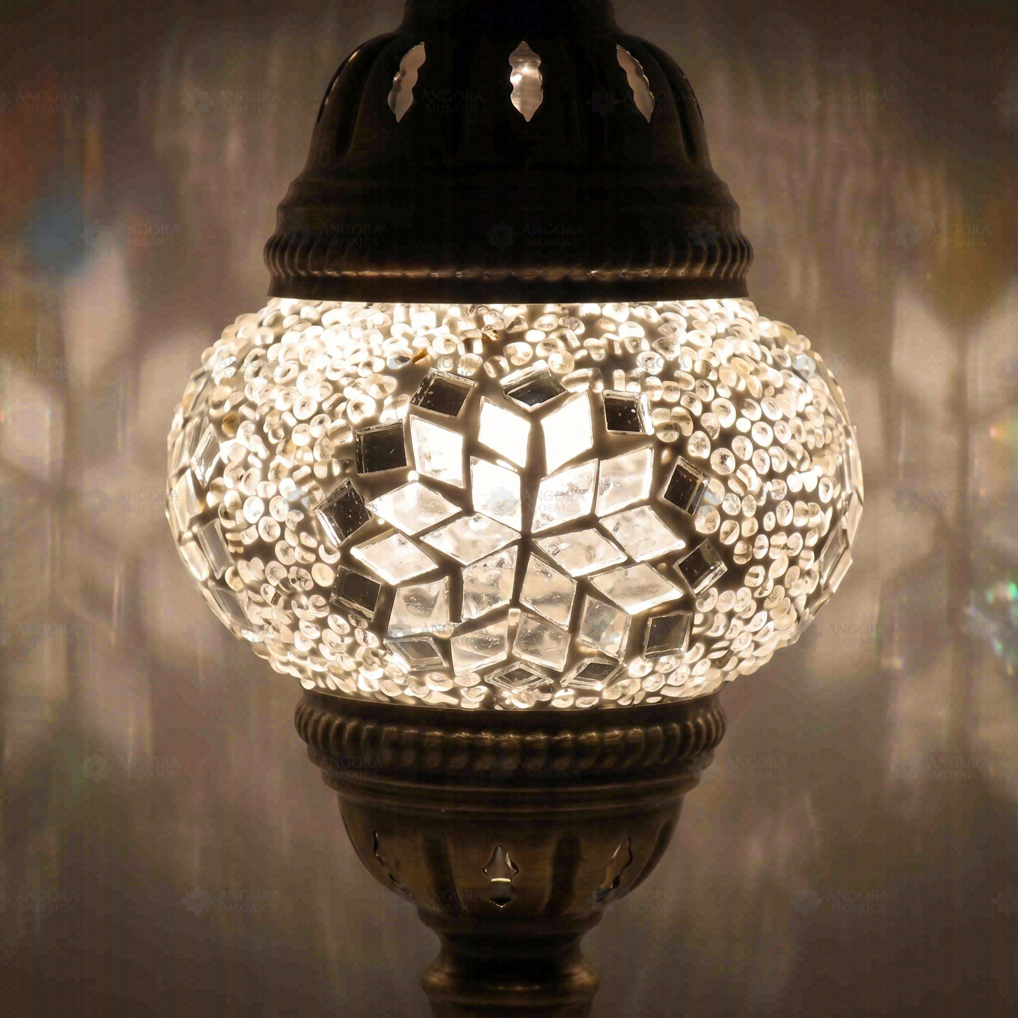 Lit close-up of mosaic glass globe — White table lamp glowing (ENV MUN1001)
