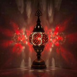 Red Turkish mosaic table lamp illuminated, showing colorful light projection (ENV MUN1003)