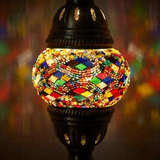 Lit close-up of mosaic glass globe — Multicolor table lamp glowing (ENV MUN1010)