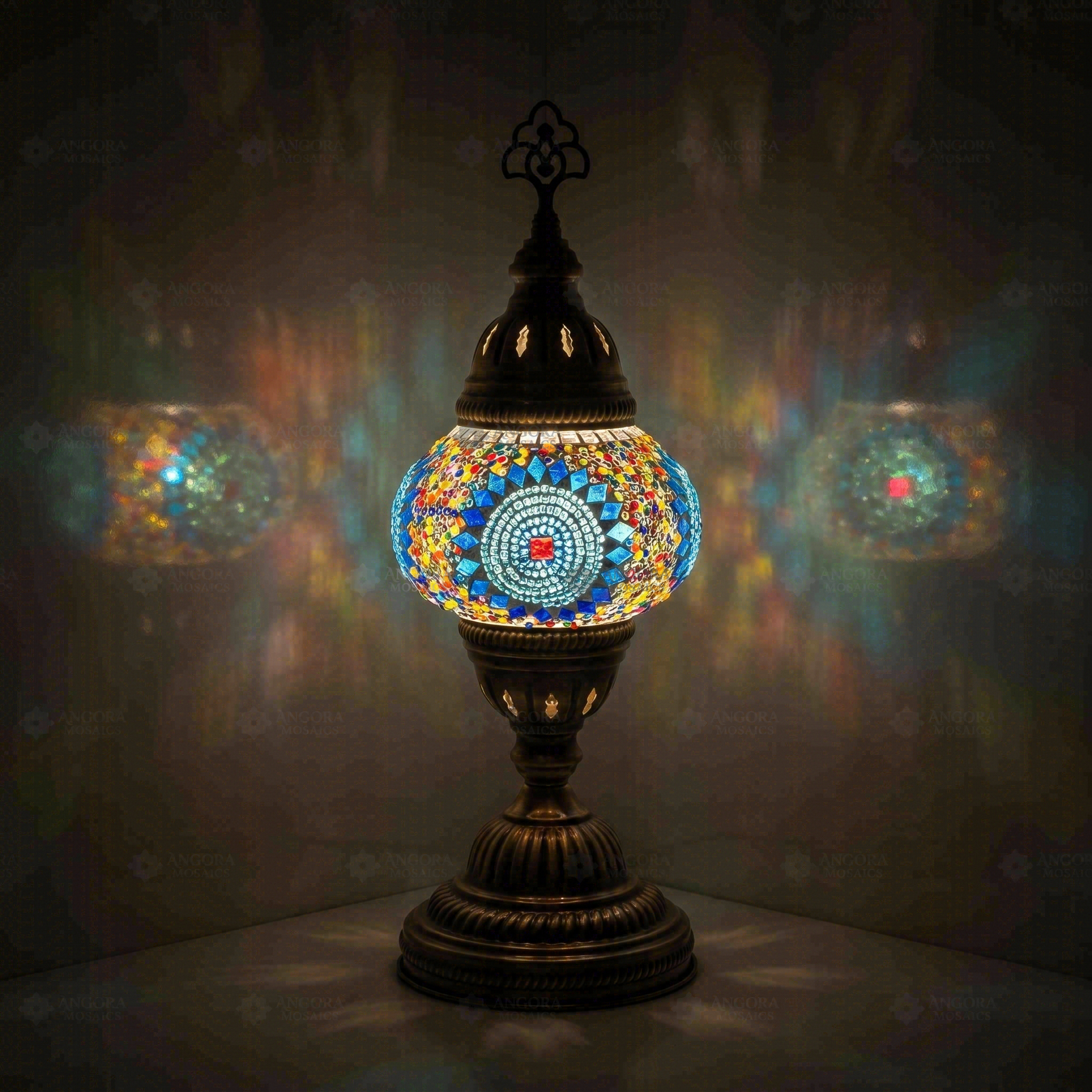 Blue Turkish mosaic table lamp illuminated, showing colorful light projection (ENV MUN2010)