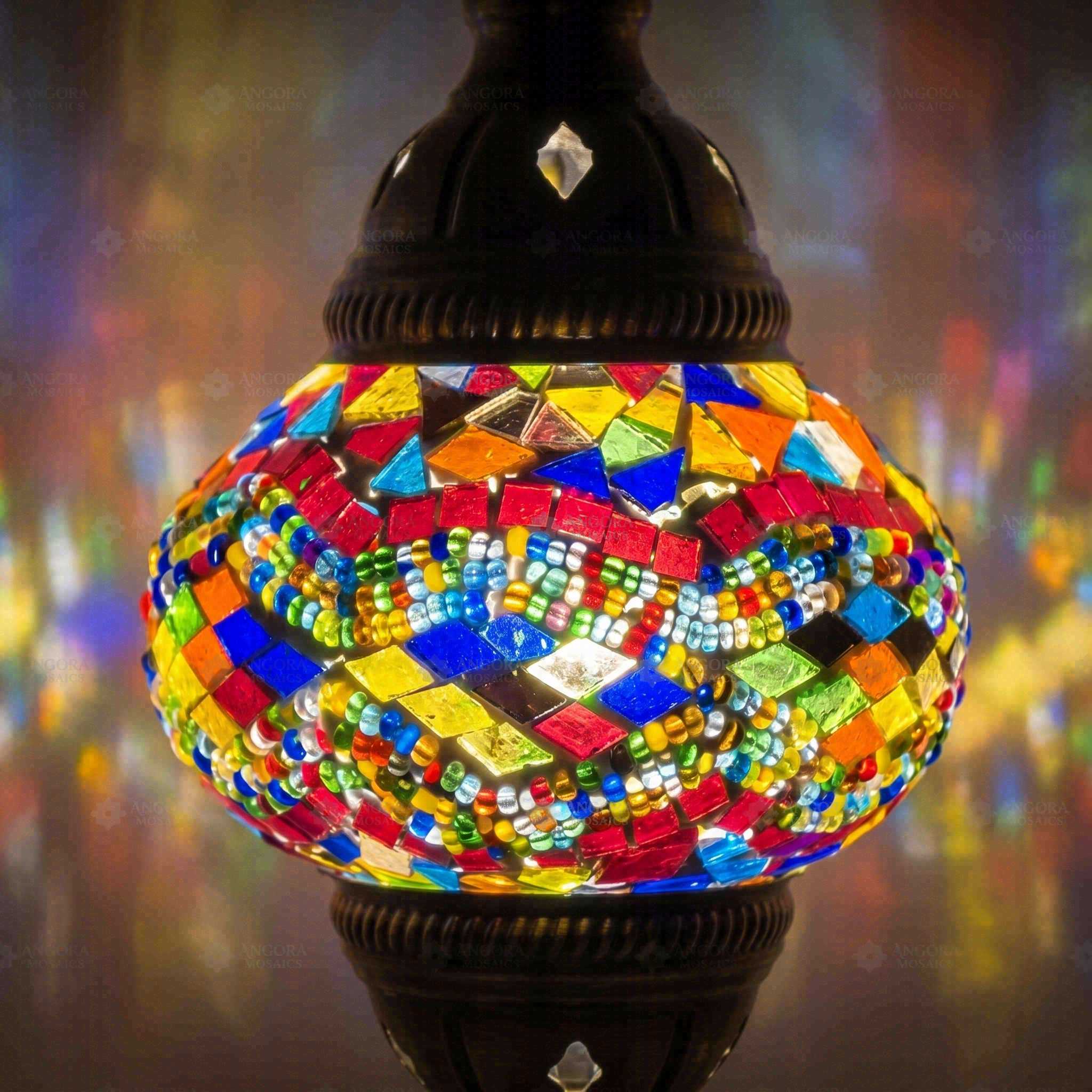 Lit close-up of mosaic glass globe — Multicolor table lamp glowing (ENV MUN2012)