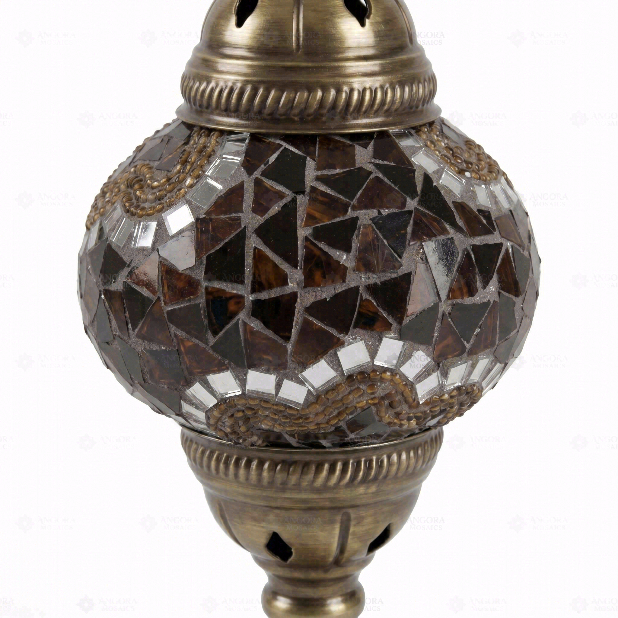 Close-up of Amber warm amber mosaic glass globe pattern — table lamp (ENV MUN2079)