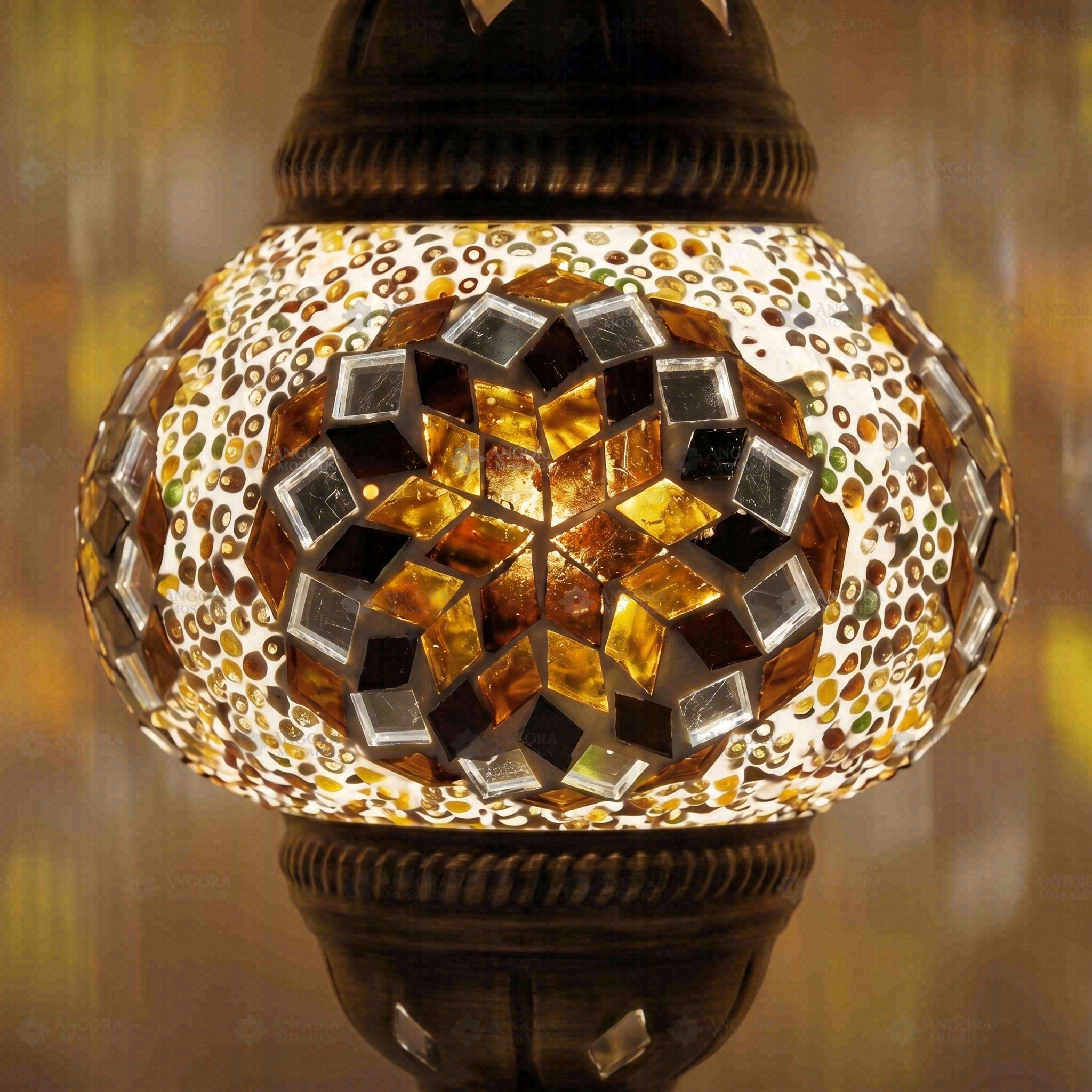 Lit close-up of mosaic glass globe — Amber table lamp glowing (ENV MUN2118)