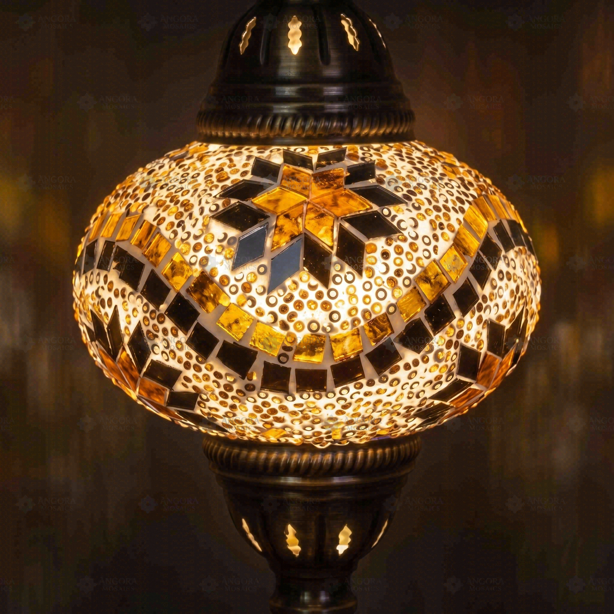 Lit close-up of mosaic glass globe — Amber table lamp glowing (ENV MUN3009)