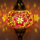 Lit close-up of mosaic glass globe — Red table lamp glowing (ENV MUN3011)