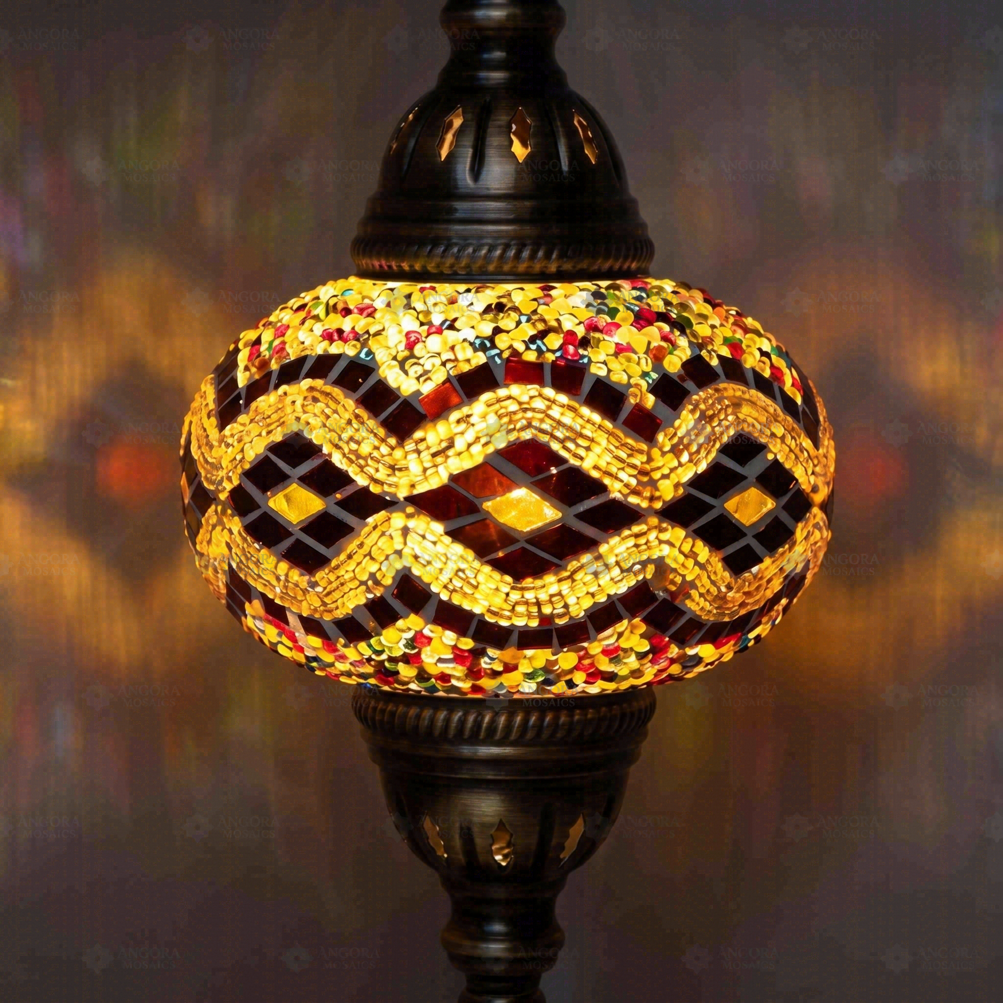Lit close-up of mosaic glass globe — Warm Tones table lamp glowing (ENV MUN3013)