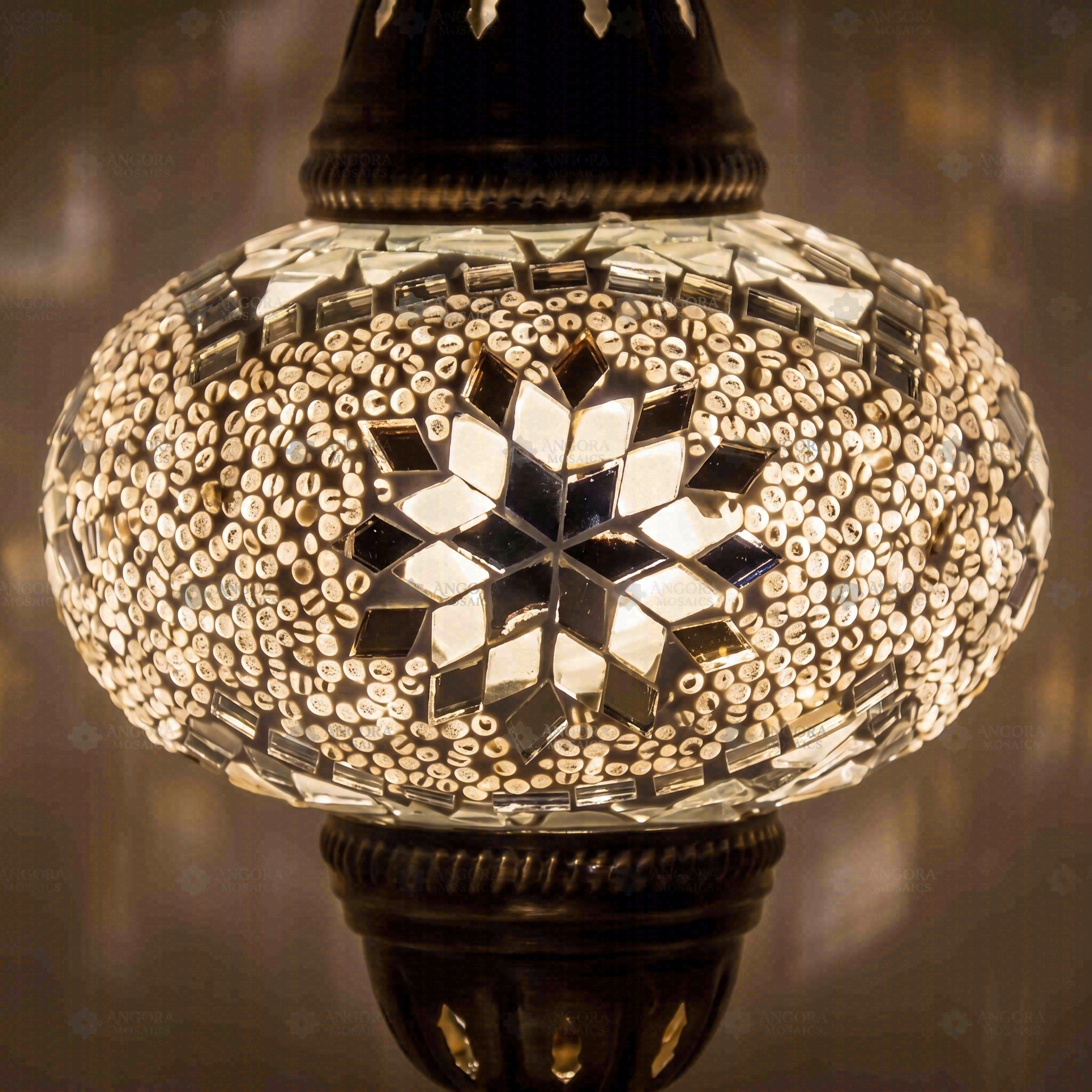 Lit close-up of mosaic glass globe — White table lamp glowing (ENV MUN3022)