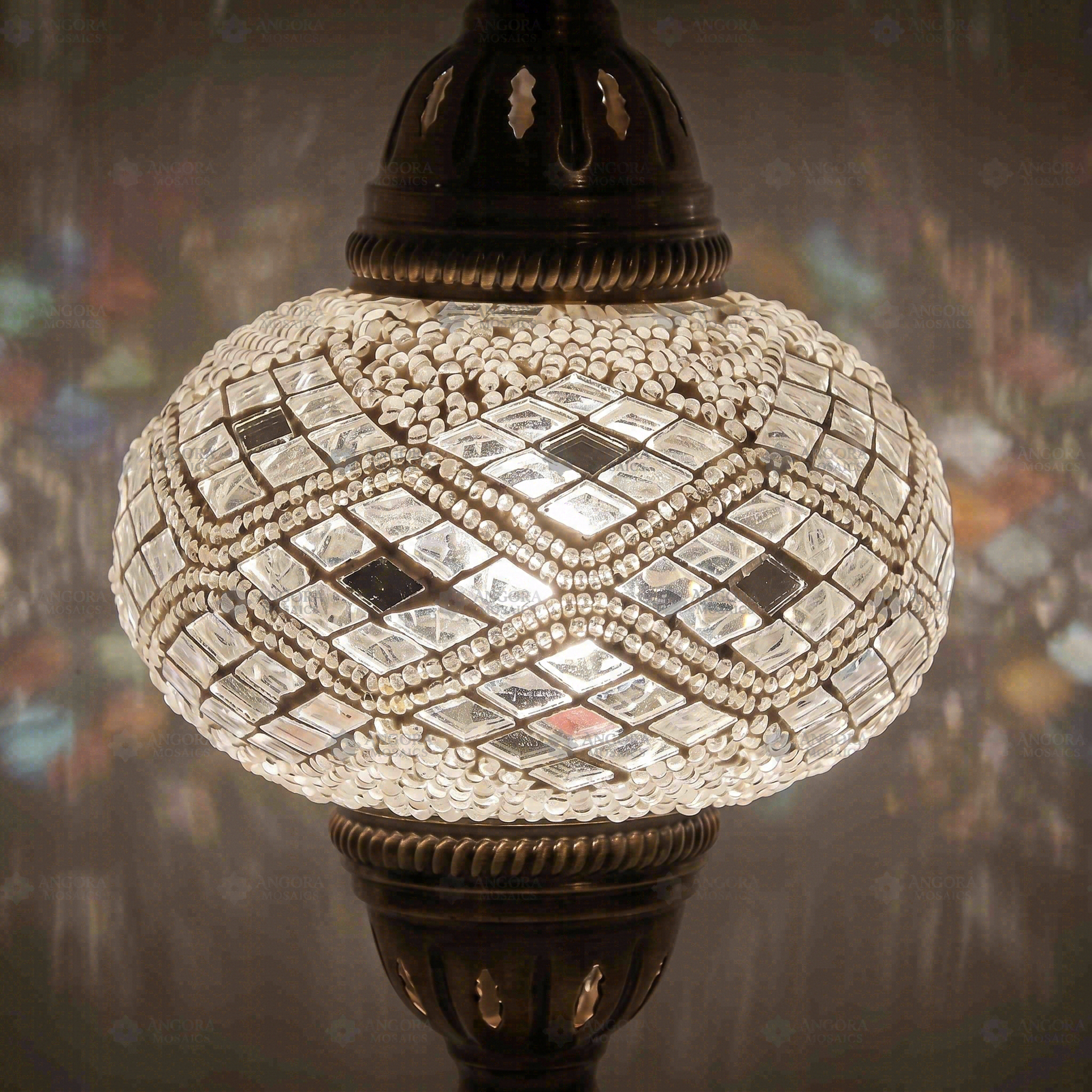 Lit close-up of mosaic glass globe — White table lamp glowing (ENV MUN3023)