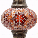 Close-up of Amber warm amber mosaic glass globe pattern — table lamp (ENV MUN3025)