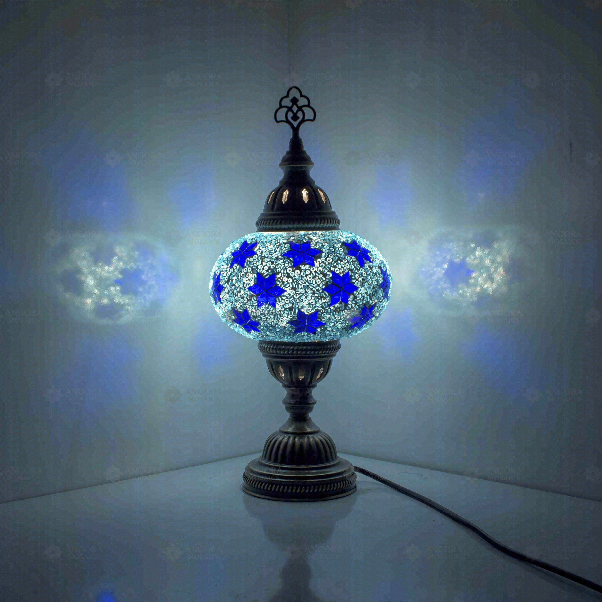 Blue Turkish mosaic table lamp illuminated, showing colorful light projection (ENV MUN3027)