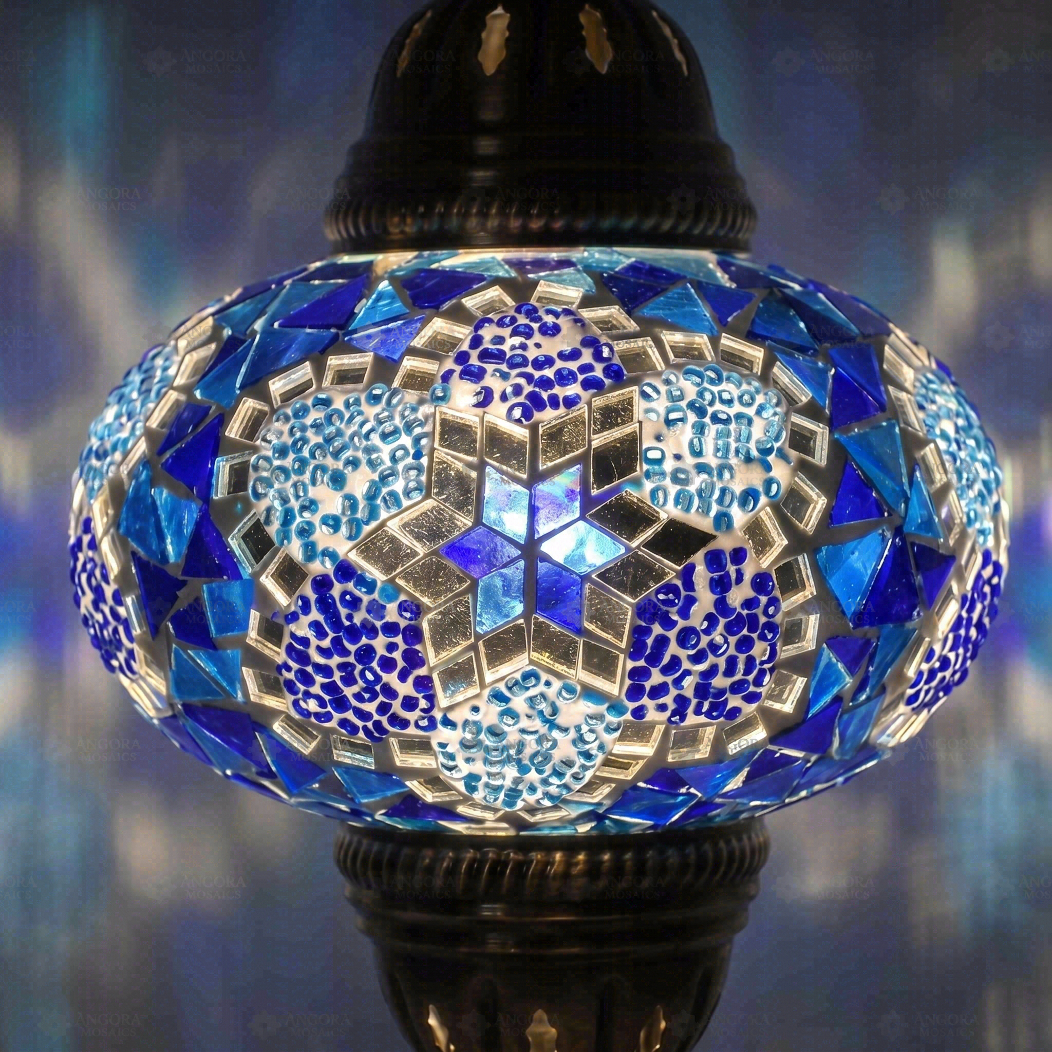 Lit close-up of mosaic glass globe — Blue table lamp glowing (ENV MUN3034)
