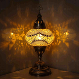 Clear Turkish mosaic table lamp illuminated, showing colorful light projection (ENV MUN3036)