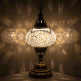 White Turkish mosaic table lamp illuminated, showing colorful light projection (ENV MUN3043)
