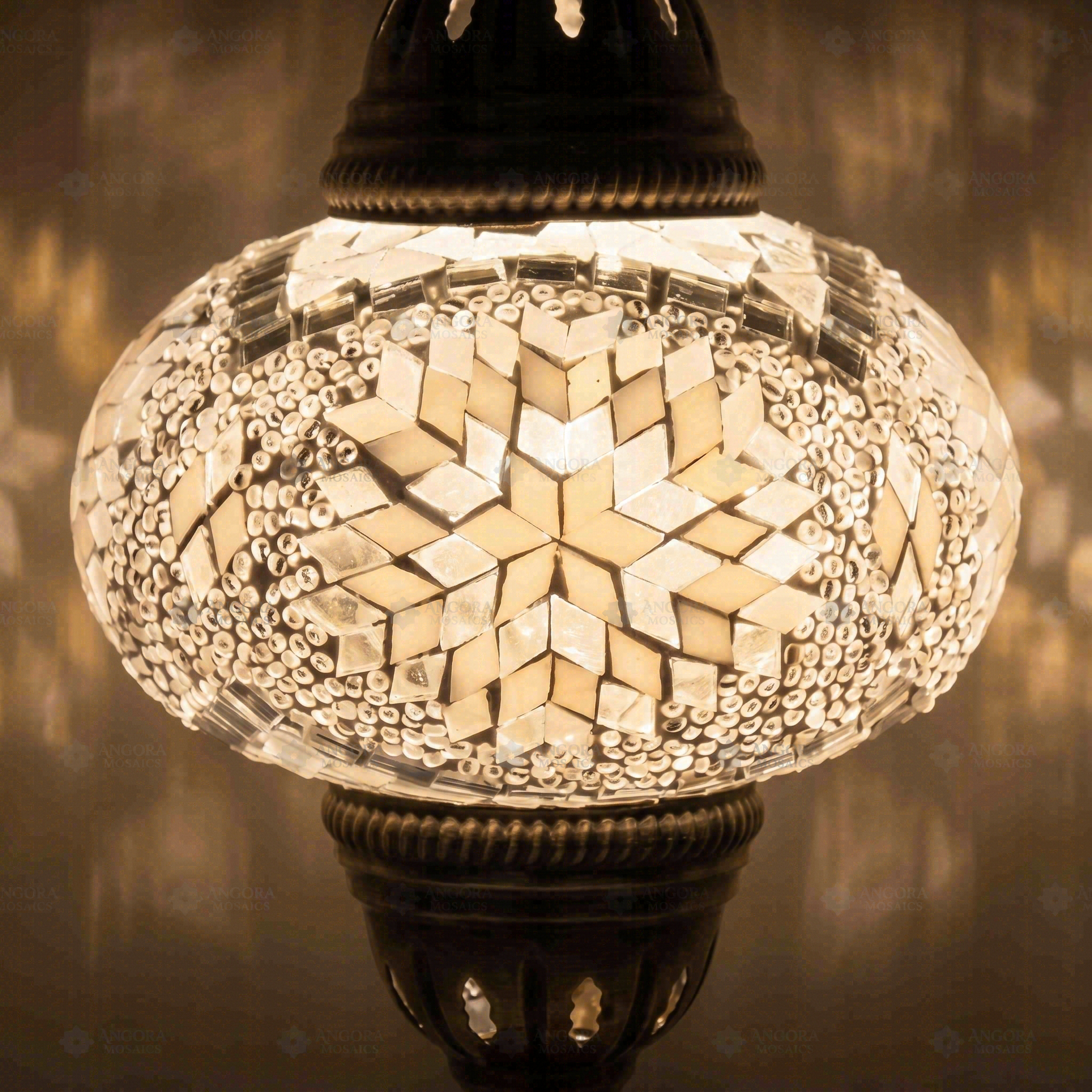 Lit close-up of mosaic glass globe — White table lamp glowing (ENV MUN3043)