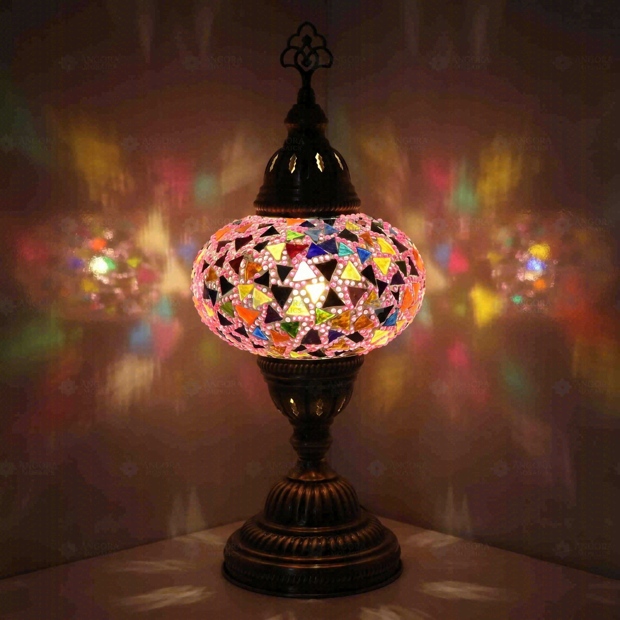 Pink Turkish mosaic table lamp illuminated, showing colorful light projection (ENV MUN3046)