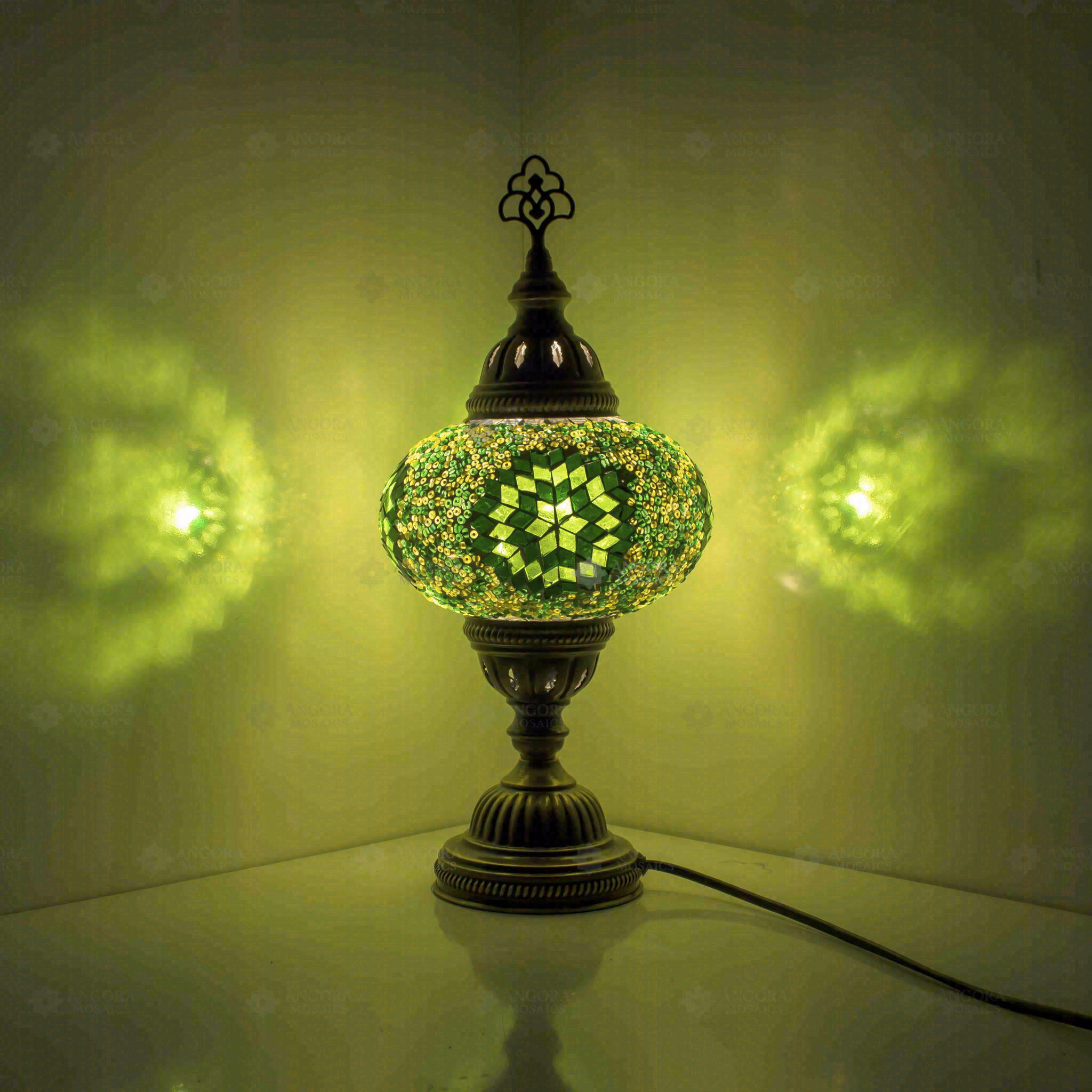 Green Turkish mosaic table lamp illuminated, showing colorful light projection (ENV MUN3048)
