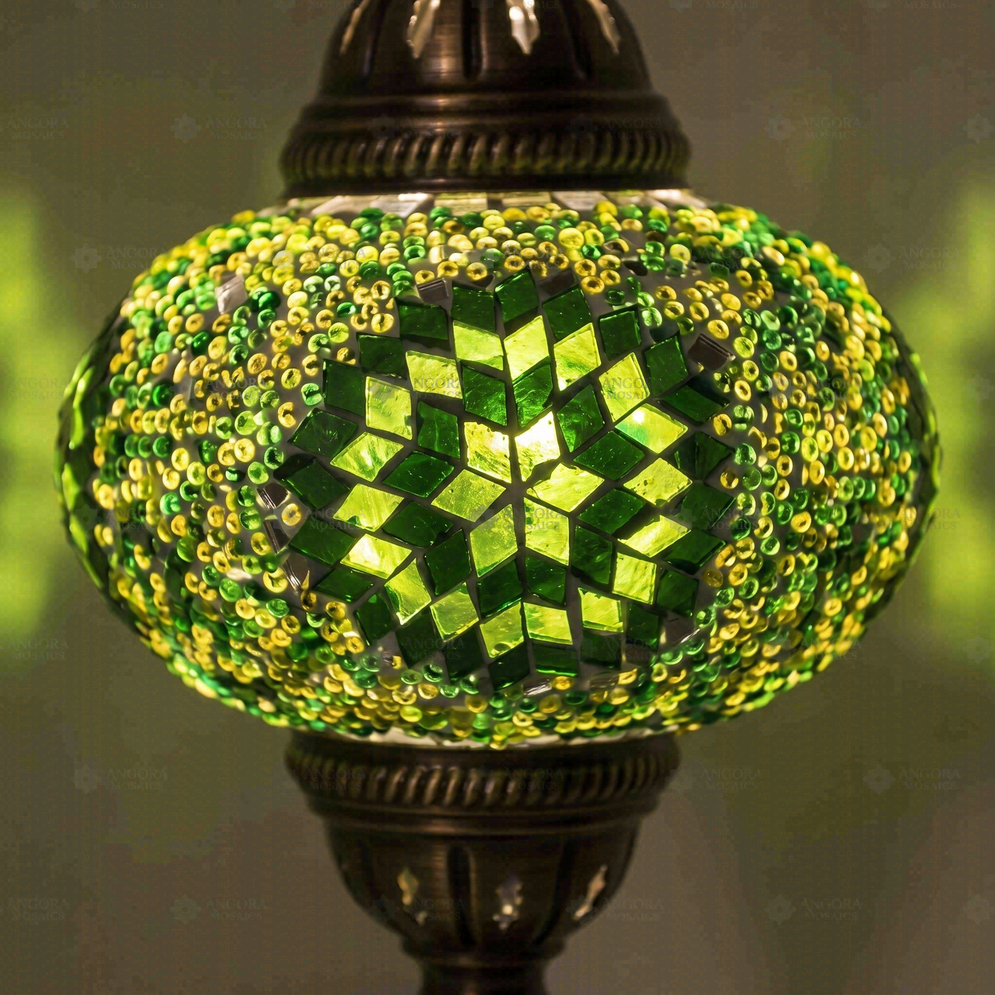 Lit close-up of mosaic glass globe — Green table lamp glowing (ENV MUN3048)