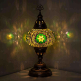 Green Turkish mosaic table lamp illuminated, showing colorful light projection (ENV MUN3050)