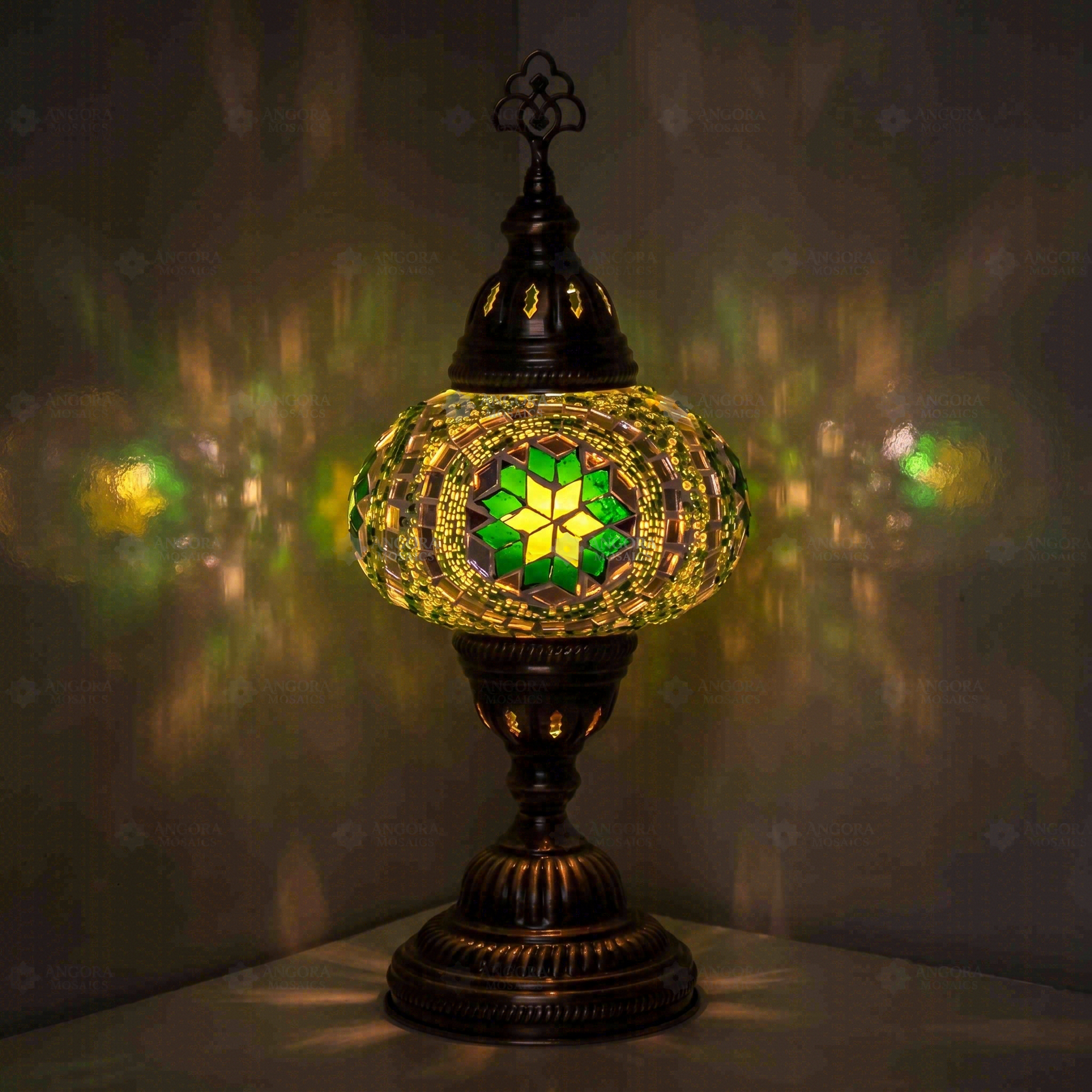 Green Turkish mosaic table lamp illuminated, showing colorful light projection (ENV MUN3050)