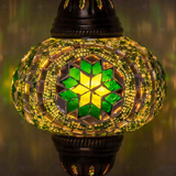 Lit close-up of mosaic glass globe — Green table lamp glowing (ENV MUN3050)