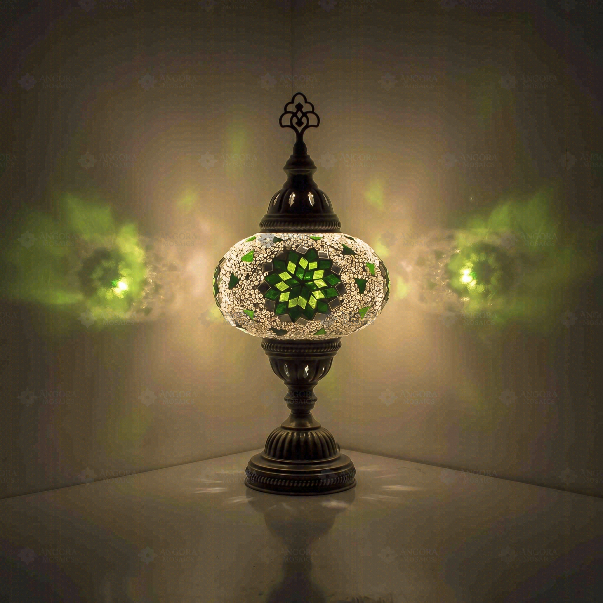 Green Turkish mosaic table lamp illuminated, showing colorful light projection (ENV MUN3055)