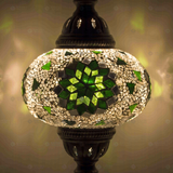 Lit close-up of mosaic glass globe — Green table lamp glowing (ENV MUN3055)